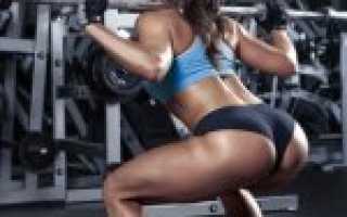 Приседания со штангой для девушек: техника выполнения